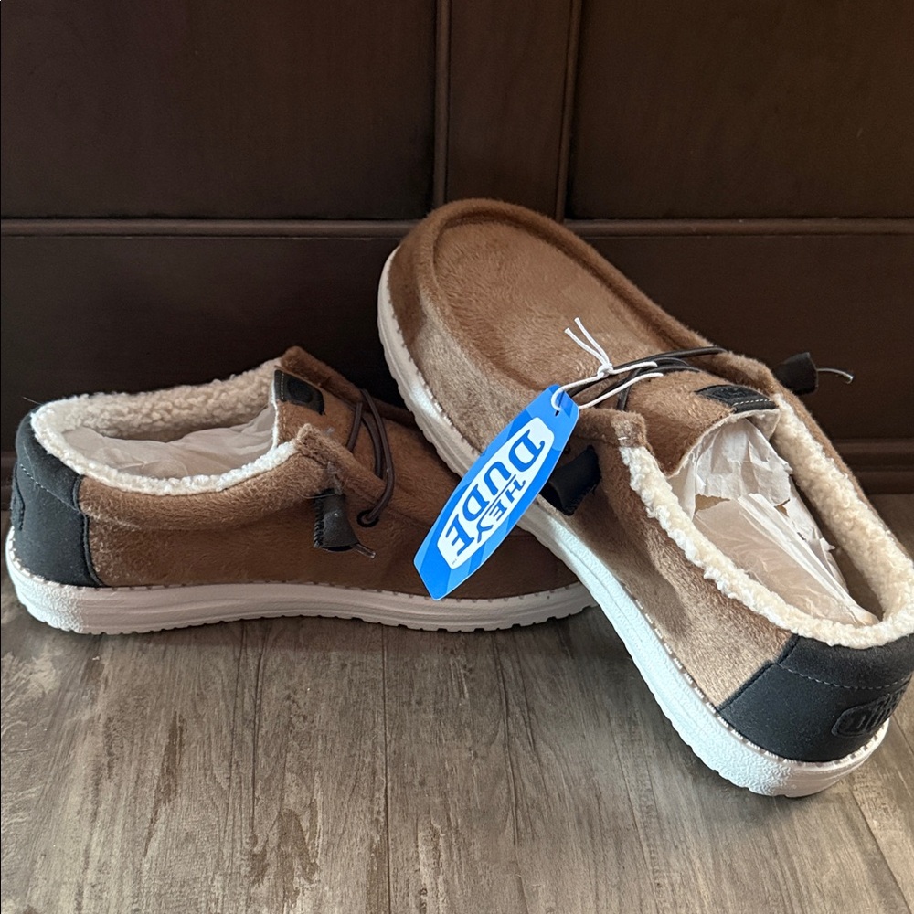 NWT Hey Dude Tan and Black Cozy Slip-Ons. Fur lined. Men’s SZ 11